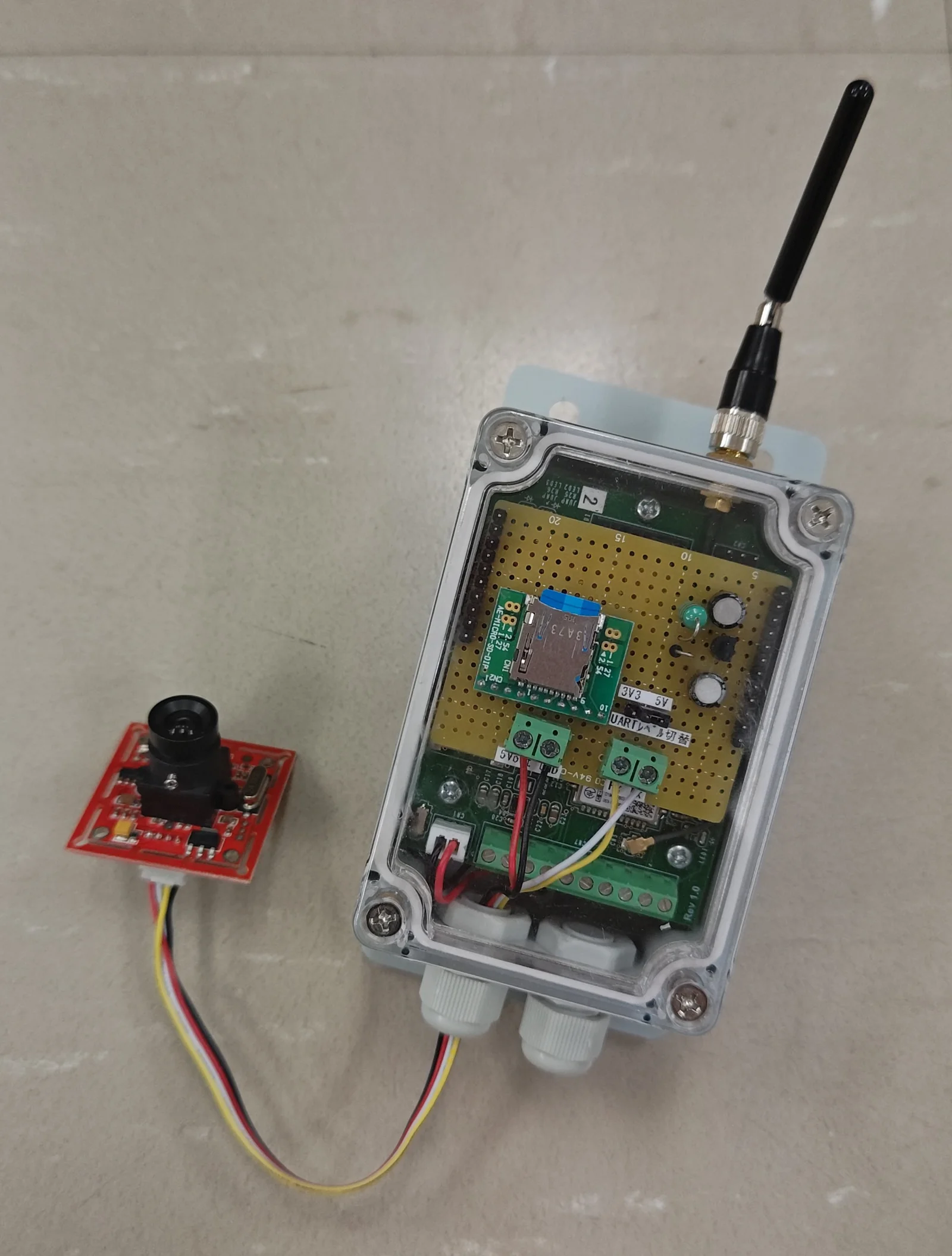 撮って、送って、また眠る ― 拡張基板 1 枚で LTE-M v2 基板を電池駆動 IoT カメラにする